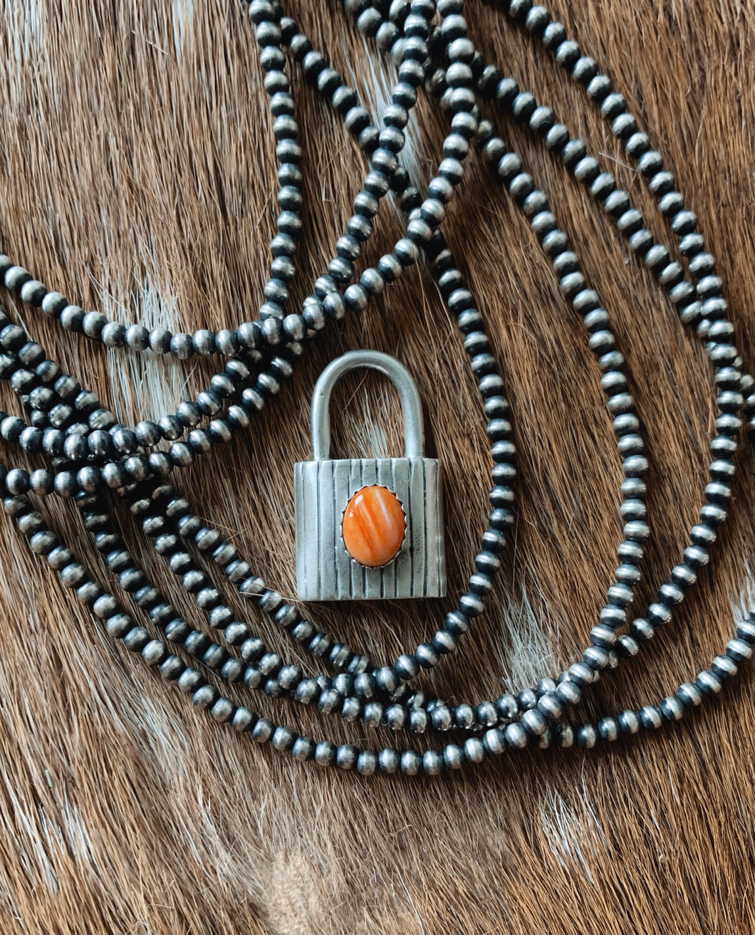 Spiny Oyster Lock Pendant